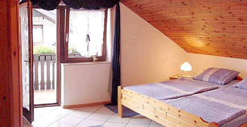 Schlafzimmer mit Balkon